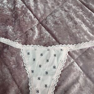 Light pink with band design thong style panties